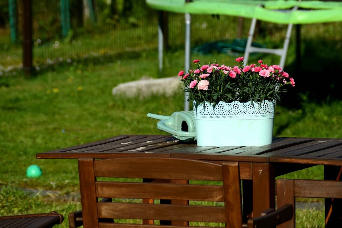 Comparison of outdoor benches metal types installed in backyard setting